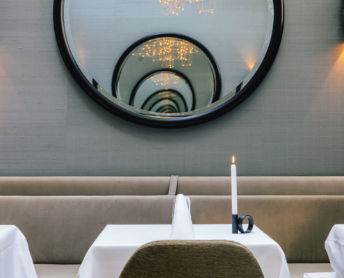 An impression of a table in the serre, semi private dining, in 2 Michelin Star Restaurant Vinkeles, in luxury boutique hotel The Dylan Amsterdam.