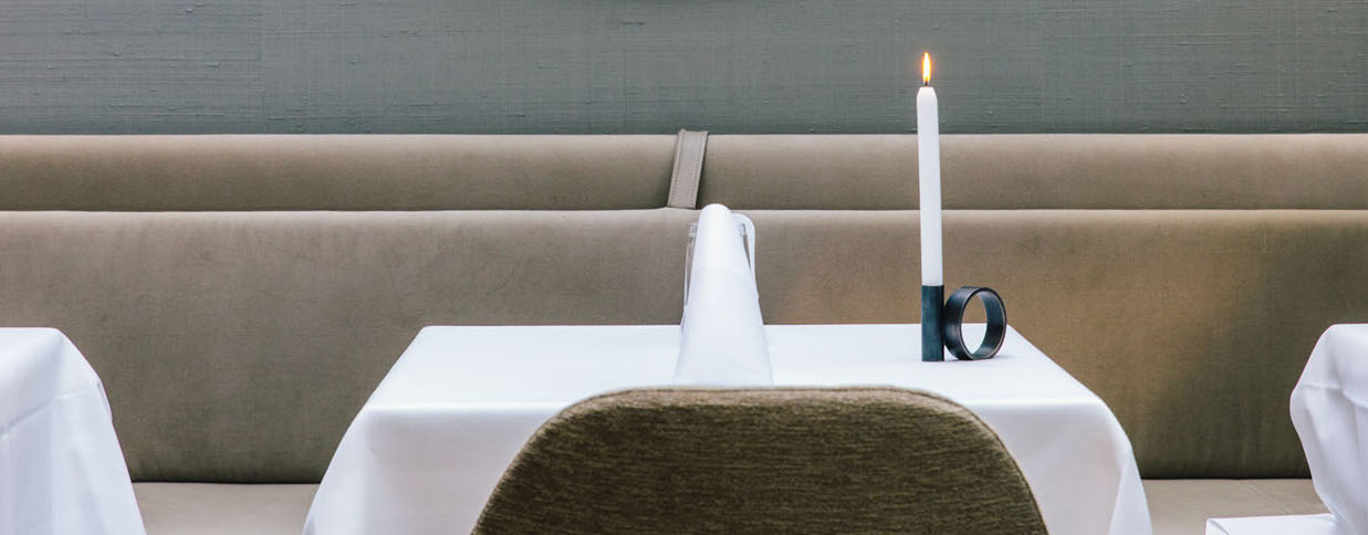 An impression of a table in the serre, semi private dining, in 2 Michelin Star Restaurant Vinkeles, in luxury boutique hotel The Dylan Amsterdam.