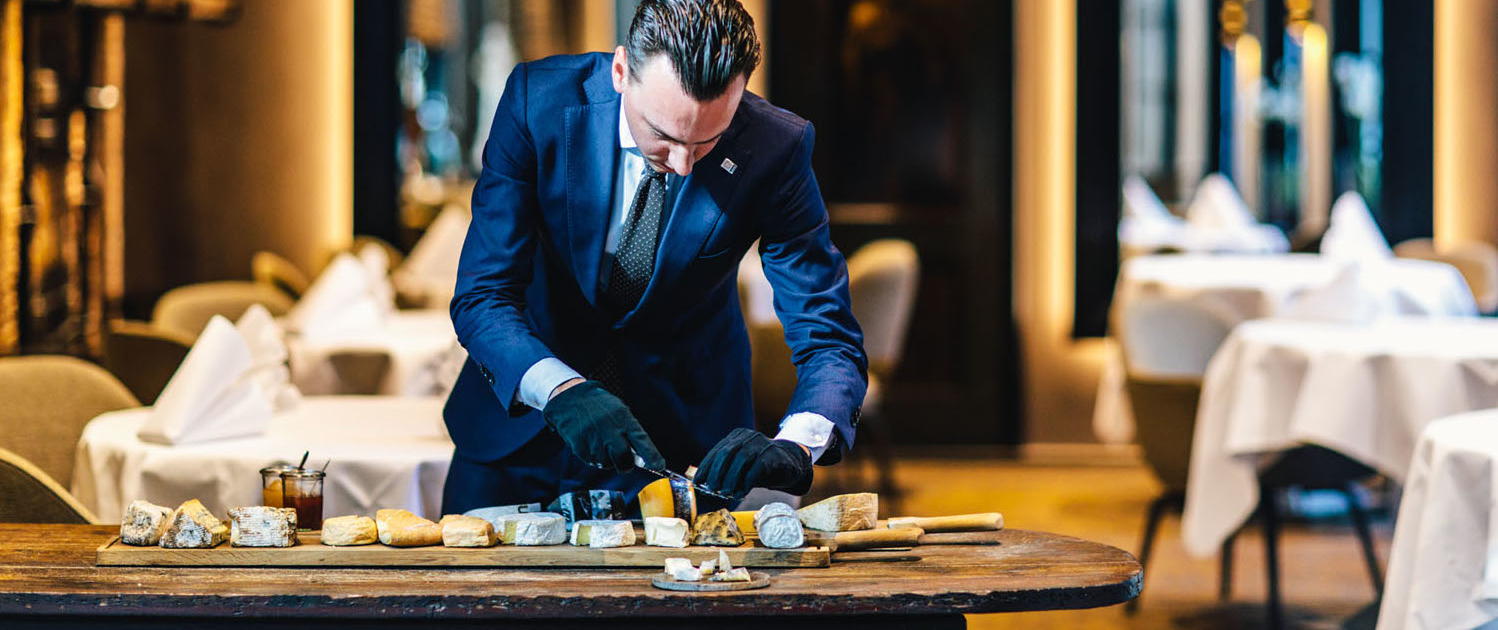 Jouke Veenstra showing his cheese platter at 2 Michelin Star Restaurant Vinkeles, in luxury boutique hotel The Dylan Amsterdam, member of the Leading Hotels of the World.