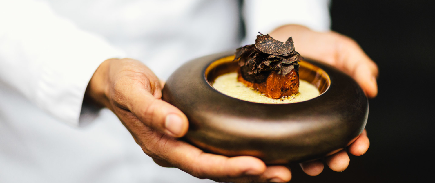 Celeriac black truffle dish at 2 Michelin Star Restaurant Vinkeles, in luxury boutique hotel The Dylan Amsterdam, member of the Leading Hotels of the World.